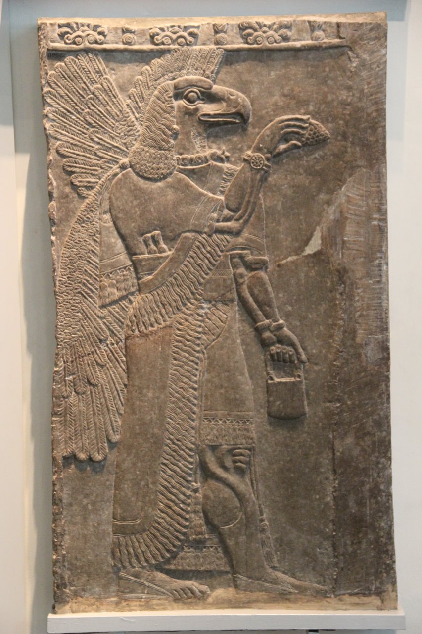 Neo-Assyrian bas-relief of an eagle-headed winged apkallu guardian spirit, Nimrud