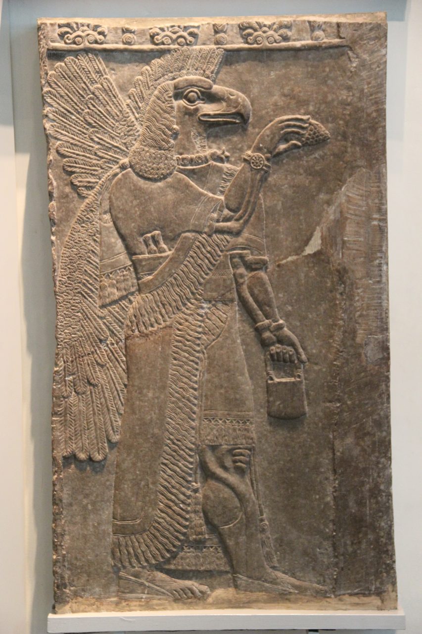 A Neo-Assyrian bas-relief of an eagle-headed winged Apkallu, in the British Museum