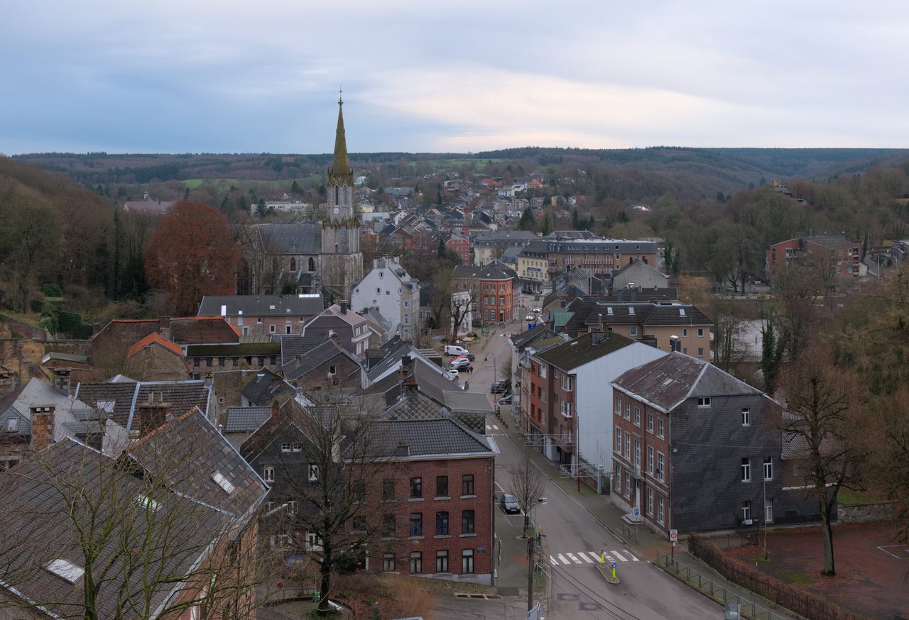 The town of Eupen in eastern Belgium on an overcast winter afternoon, seen from above its rooftops