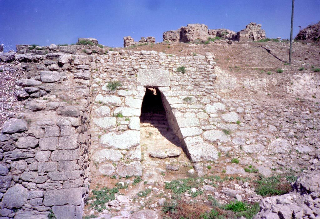 The entrance to the archaeological site of Ugarit (Ras Shamra) on the Syrian coast, showing the defense walls and a postern gateway