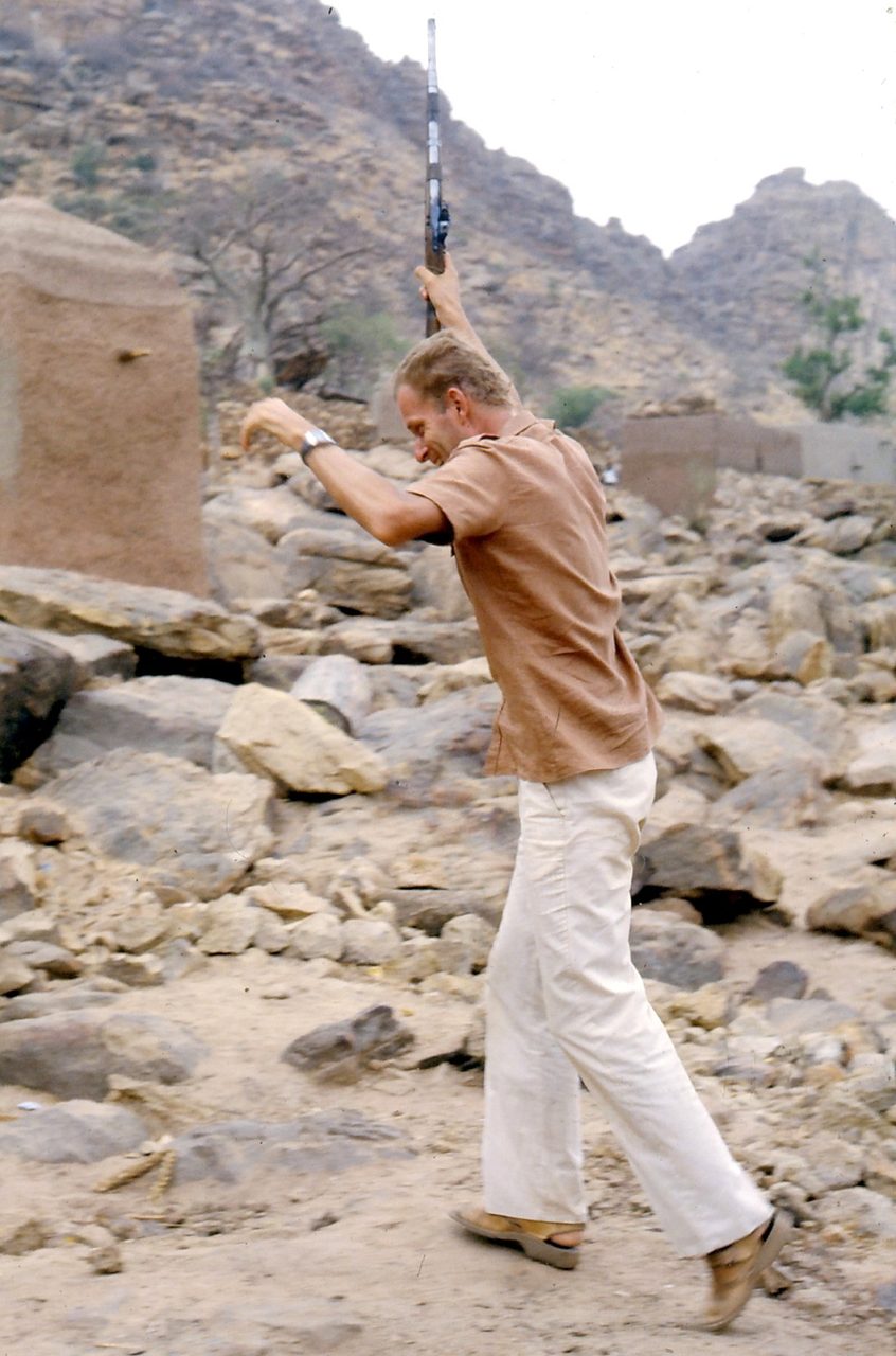 Anthropologist Wouter van Beek among stones at the Bandiagara cliff, Tireli, Mali, 1980