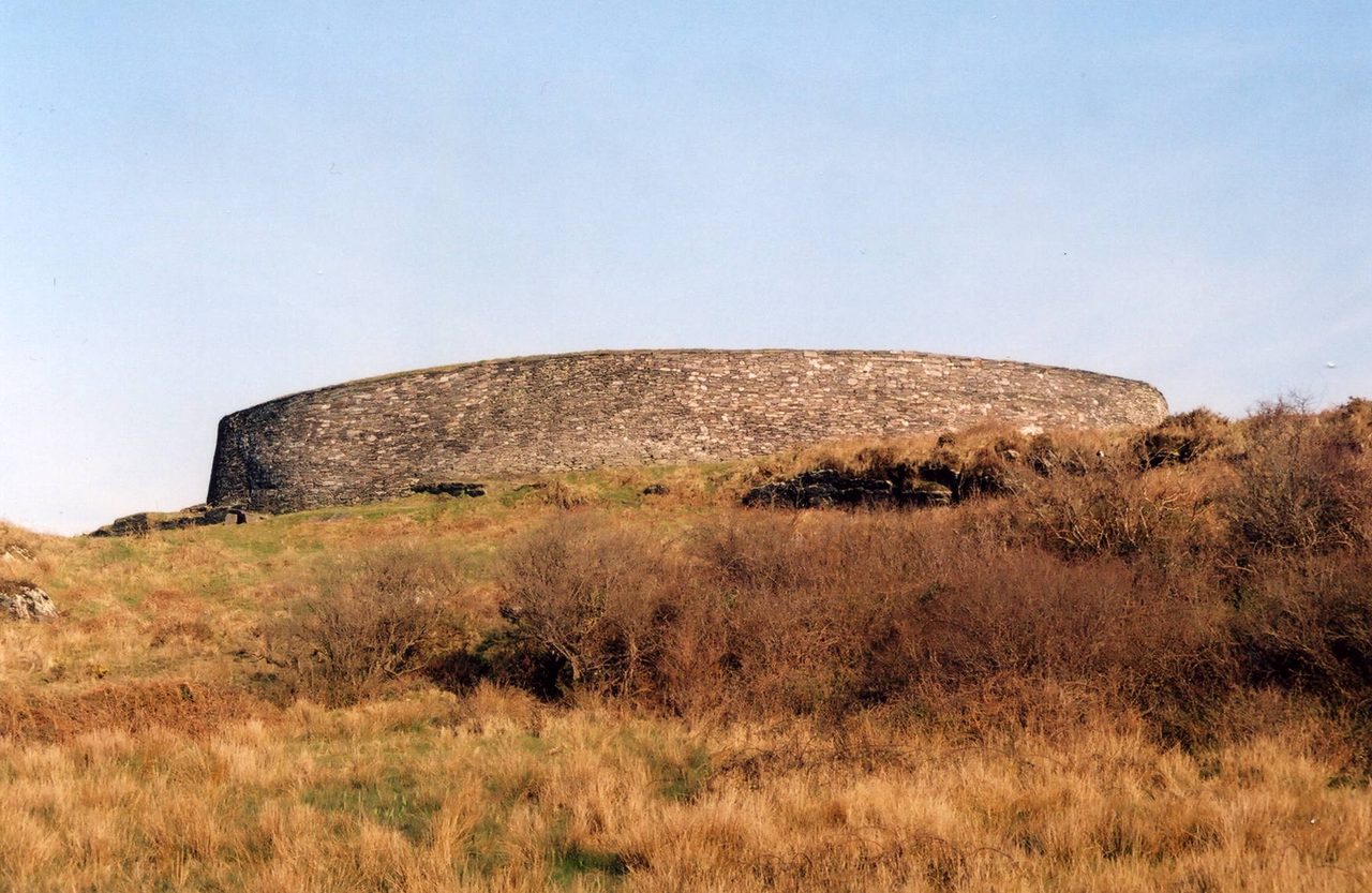 Cahergal, a drystone ringfort on a hillside in County Kerry, Ireland, under a clear sky
