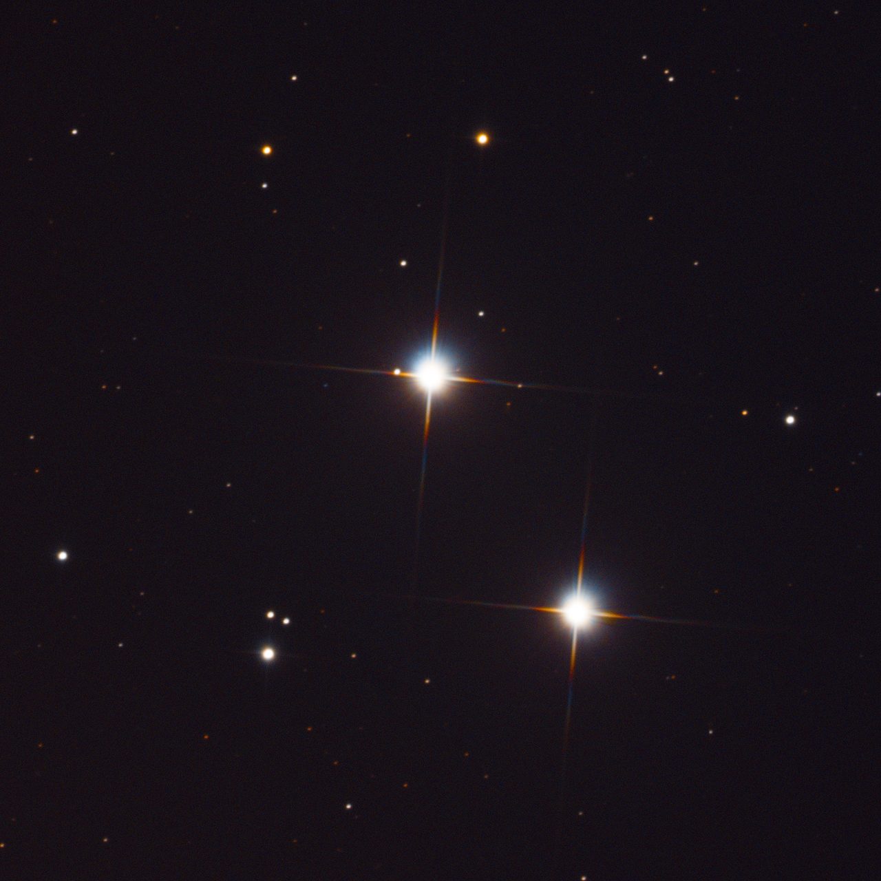 The Zeta Reticuli binary star system, the star pair abduction lore names as one of three unverified origins for the Greys