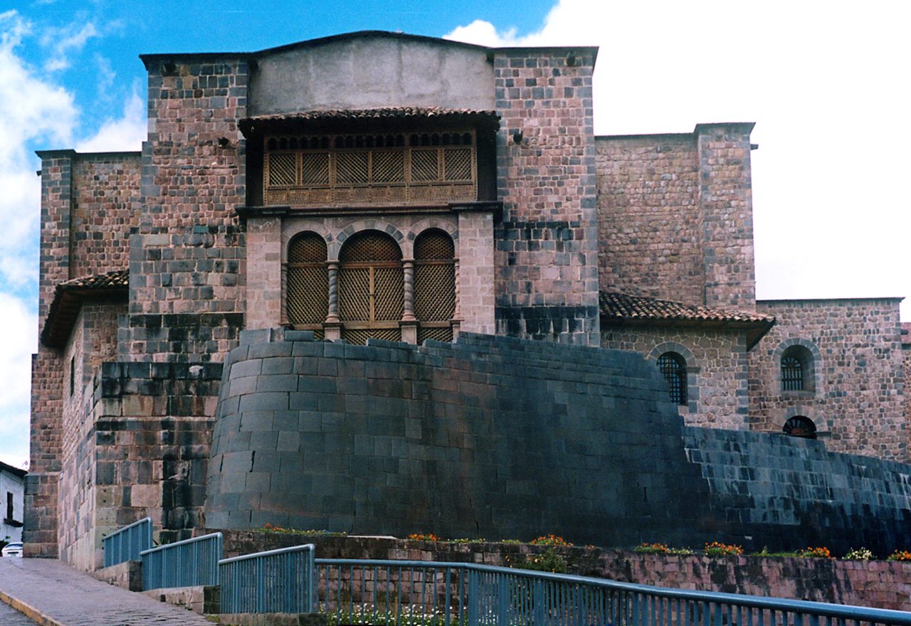 Surviving Inca stonework of the Coricancha in Cusco, with the colonial Santo Domingo convent built on top of it