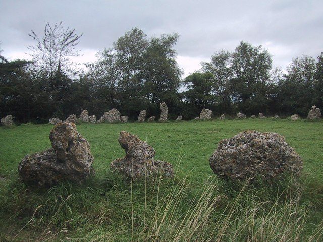 The King's Men, a ring of weathered standing stones at the Rollright Stones in Oxfordshire, under a grey sky