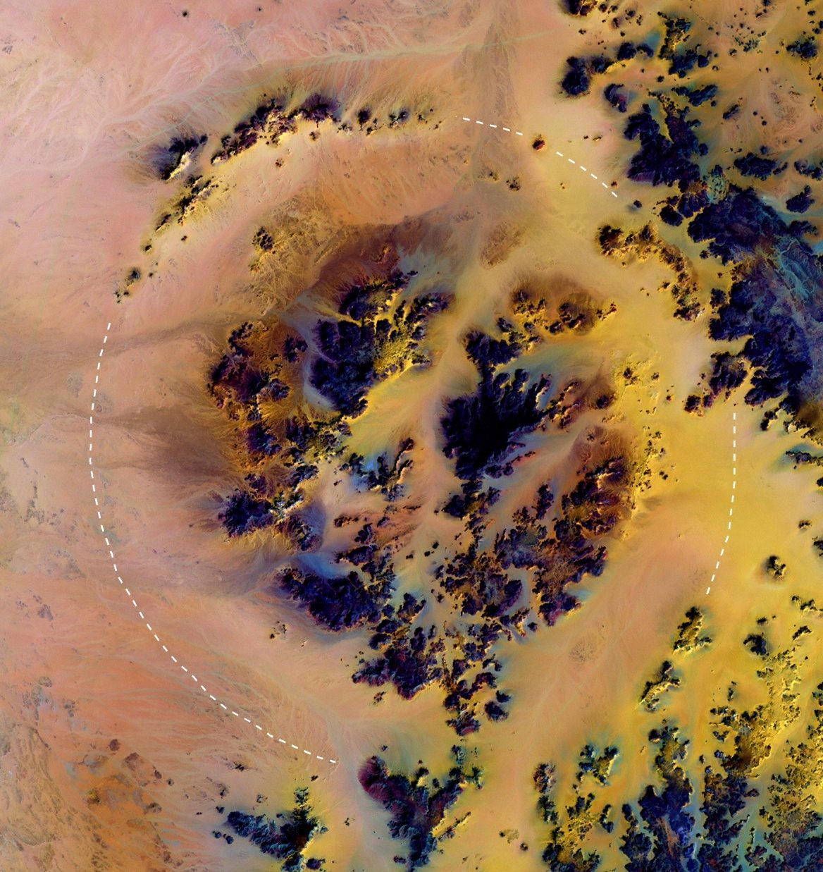A Landsat satellite image of the proposed Kebira structure in Egypt's Western Desert, with a dashed circle marking its roughly 31-kilometer outer rim.