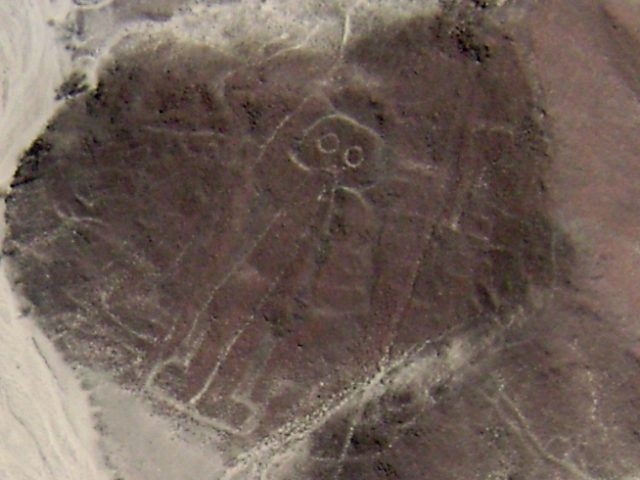 The Nazca astronaut or owl man geoglyph, a roughly 30 meter human-like figure with a rounded head on a hillside