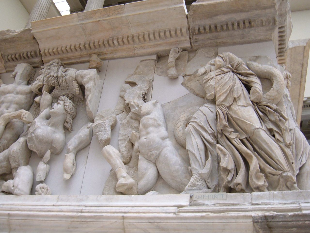 A section of the high-relief Gigantomachy frieze of the Pergamon Altar, showing the goddess Amphitrite fighting a Giant