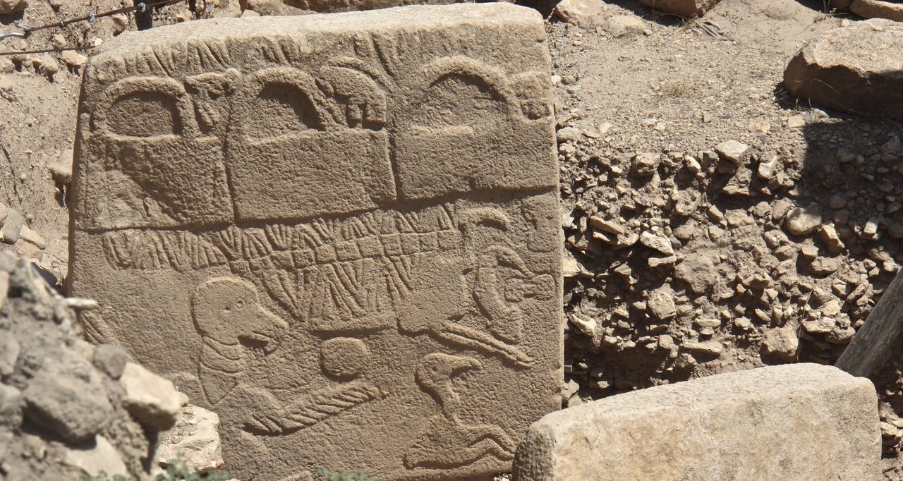 Pillar 43, the Vulture Stone, at Gobekli Tepe, carved with a large vulture, a scorpion, and a headless human figure