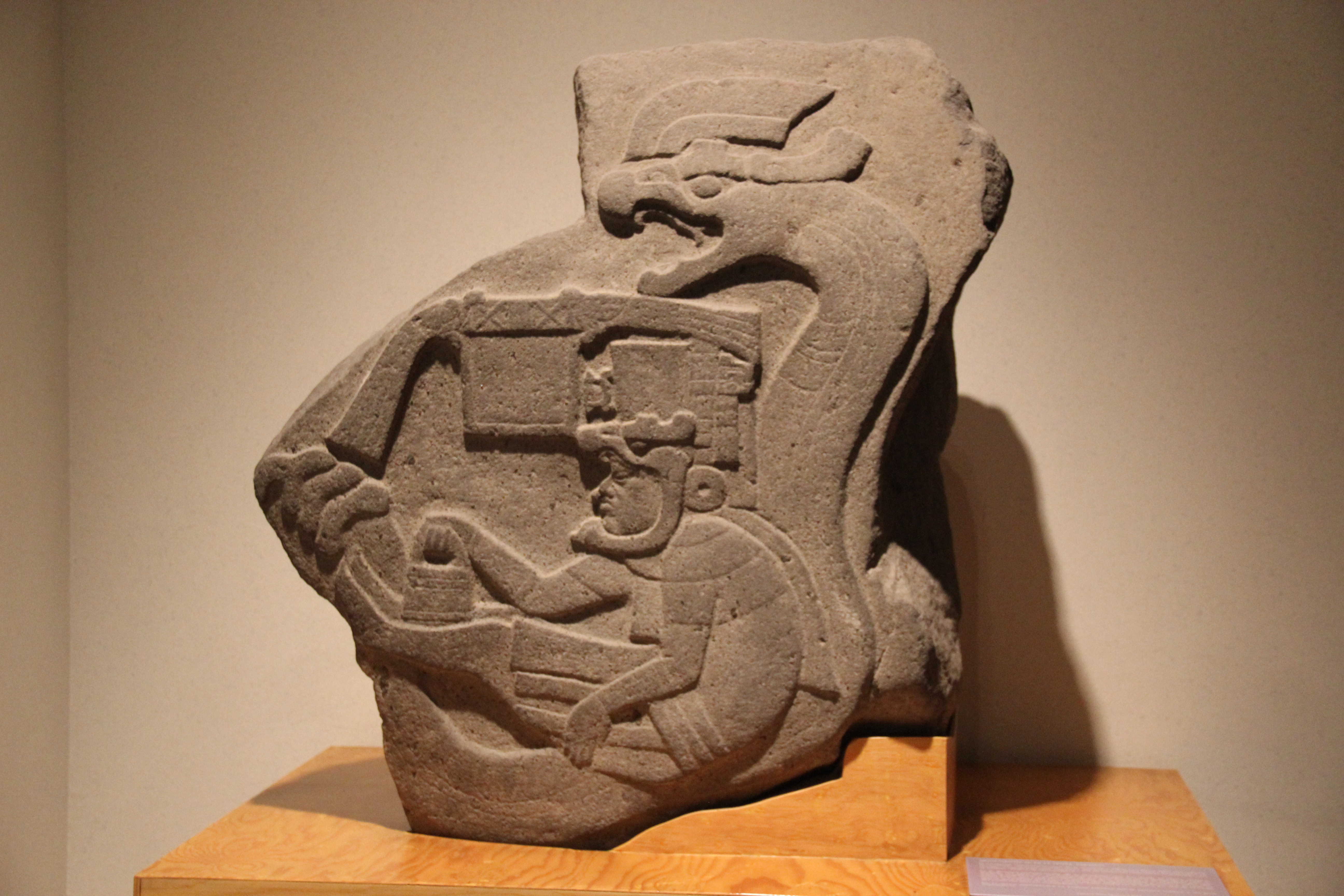 Olmec Monument 19 from La Venta, a basalt stele showing a figure seated within the coils of a feathered serpent