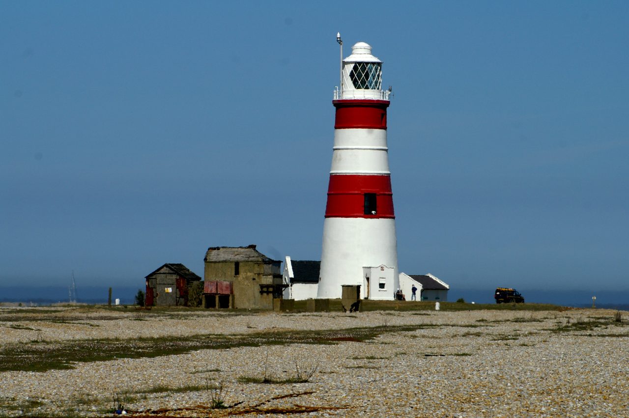 The Orfordness Lighthouse in Suffolk, a tall banded tower, seen from the south-west
