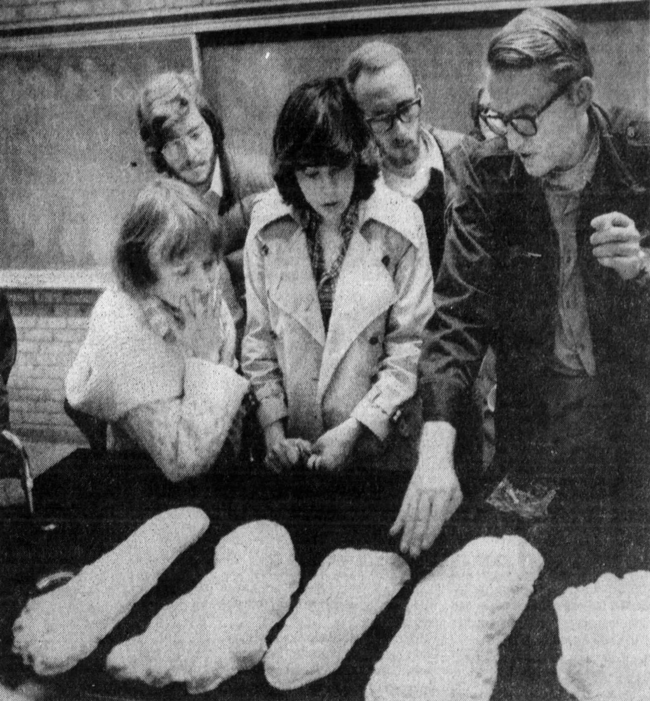 Grover Krantz displaying plaster casts of purported Sasquatch footprints, 1974