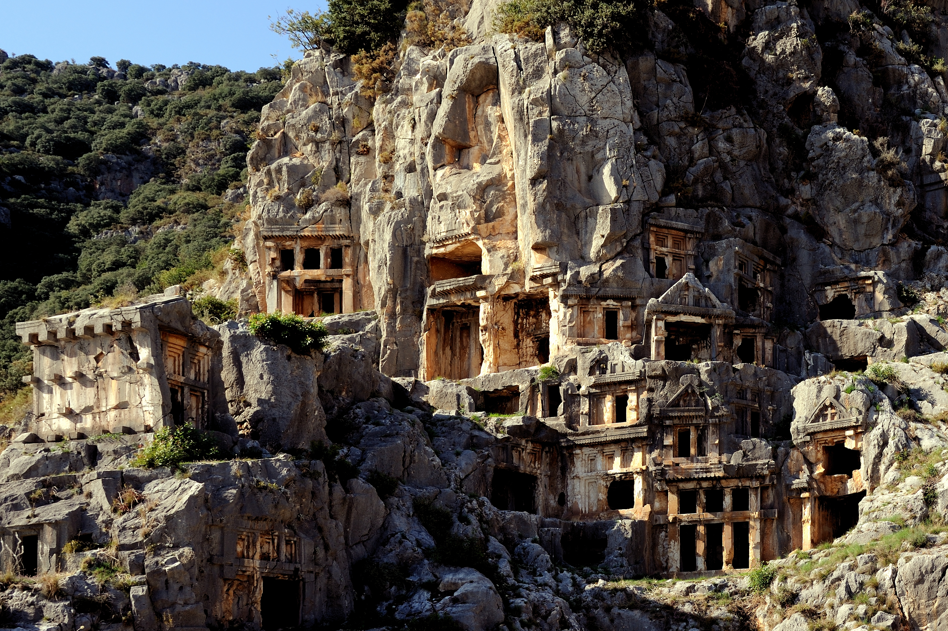 Lycian rock-cut tombs carved into the cliff face at Myra, Turkey