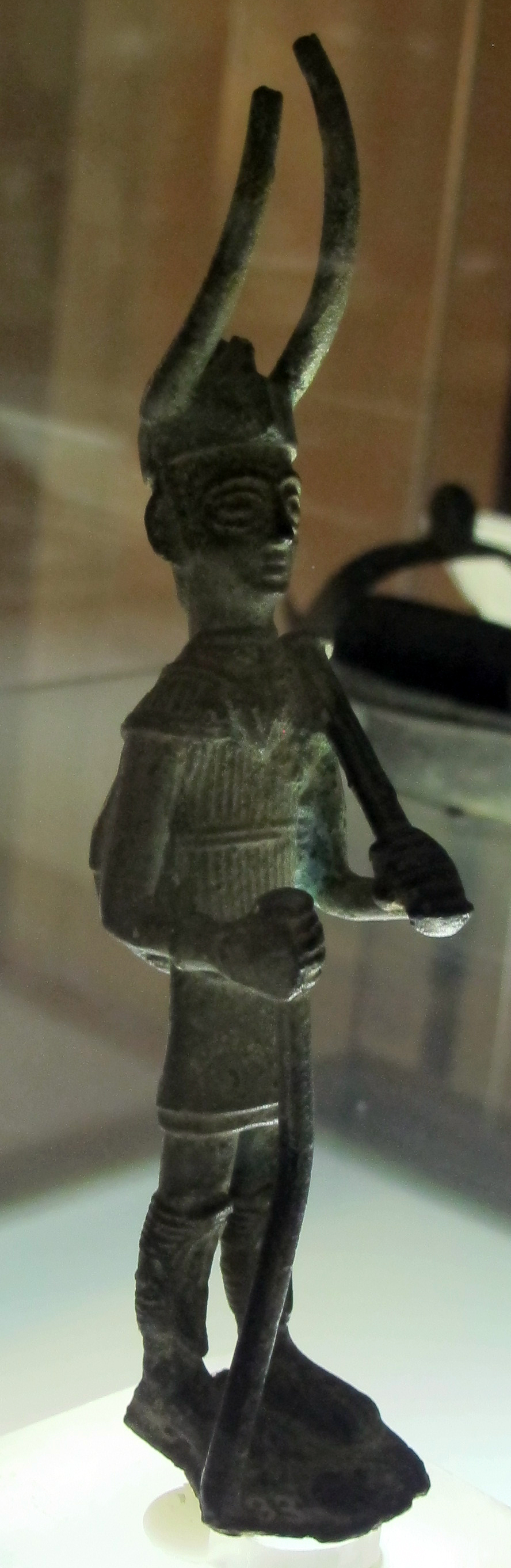 A Nuragic bronze statuette of a warrior wearing a horned helmet, 8th century BCE, National Archaeological Museum of Florence
