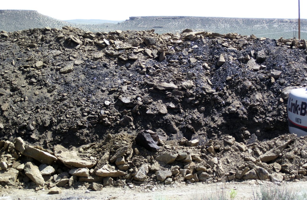 An active gilsonite mining operation at the Cowboy Dike, north of Bonanza, Utah, showing jet-black hydrocarbon mineral veins