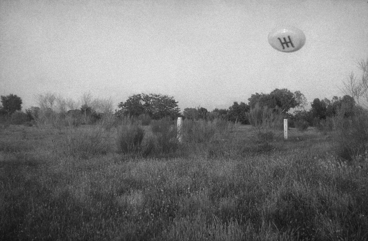 One of the four photographs taken over San José de Valderas, Alcorcón on June 1, 1967, showing the alleged Ummite craft marked with the three-bar emblem