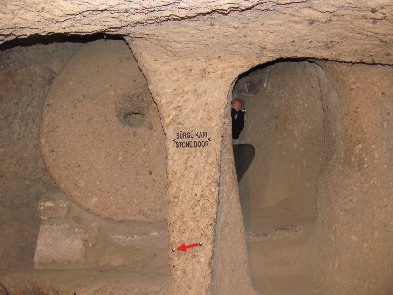 A large circular rolling stone door at Kaymakli Underground City, Cappadocia