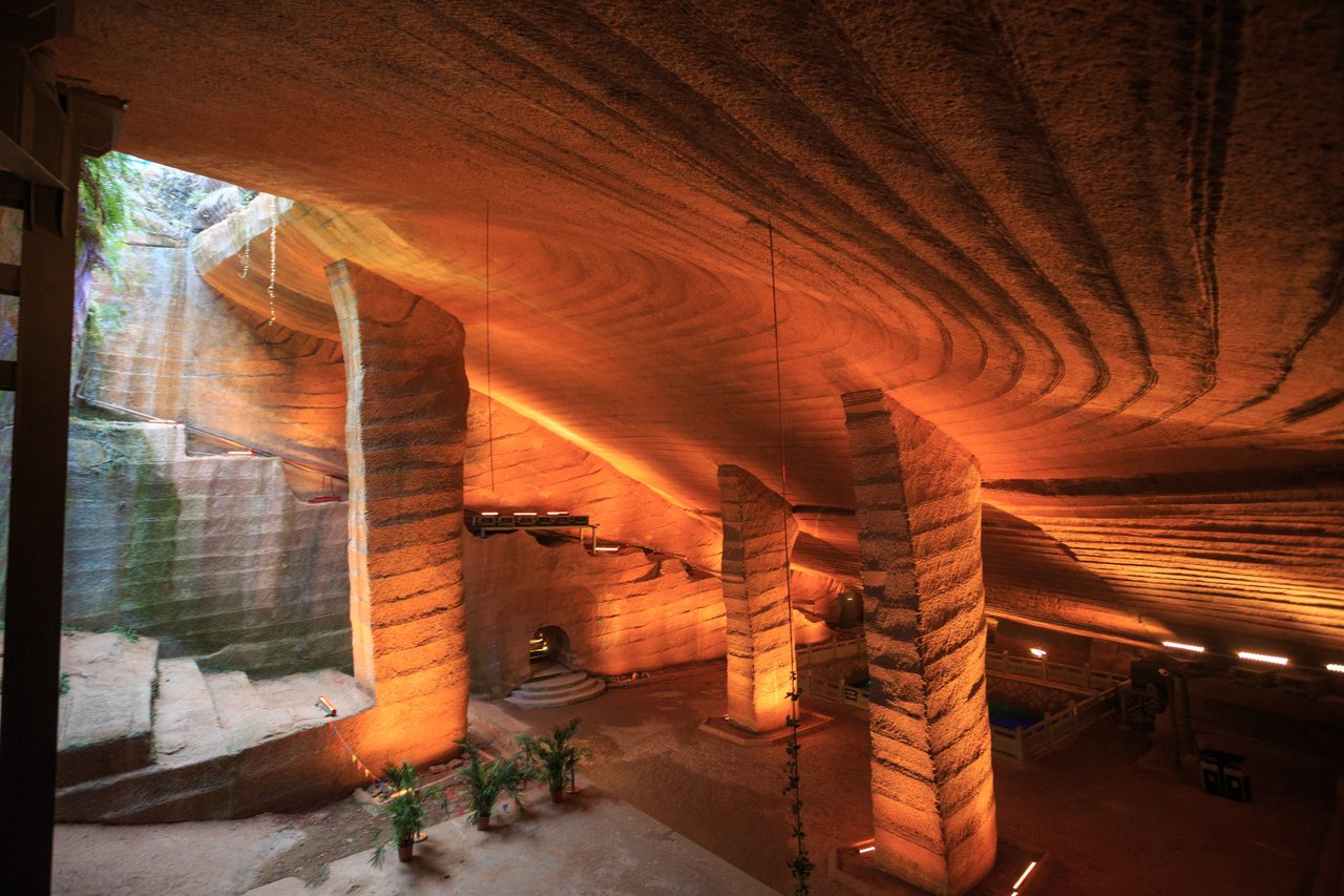 The interior of one of the Longyou Grottoes in Zhejiang Province, China, showing uniform chisel-mark walls