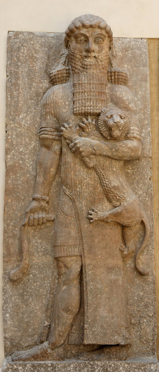 Colossal Assyrian relief of a hero subduing a lion, from Dur-Sharrukin (Khorsabad), Louvre